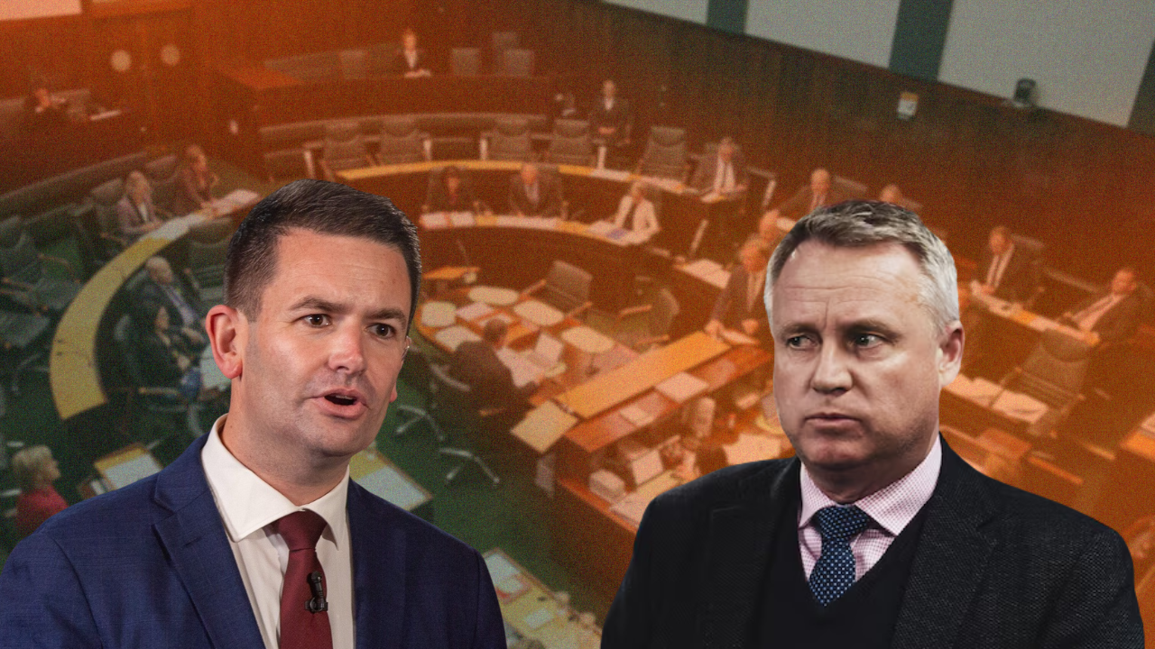 A photo of the Tasmanian house of Assembly with a photo of dean winter and jeremy rockliff in the foreground